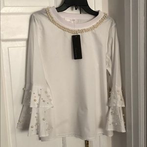 Size small Brand new blouse with ruffled sleeves